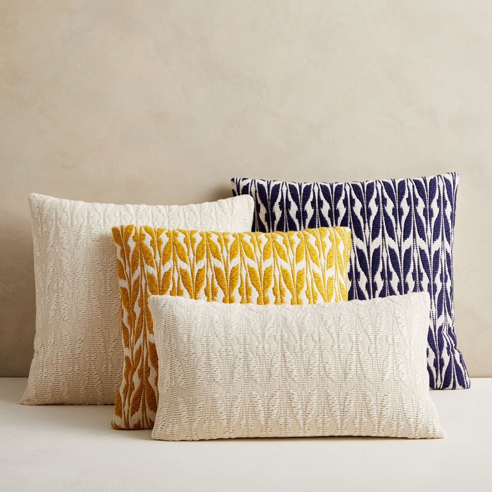 White and yellow sales pillows