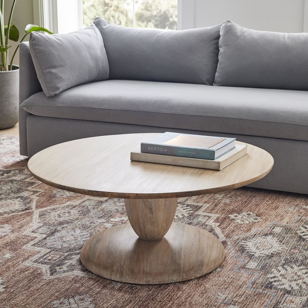 Round wood shop pedestal coffee table