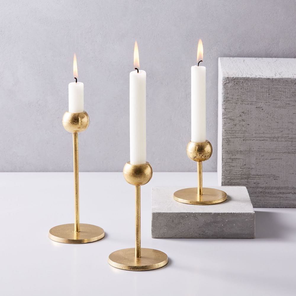 https://www.westelm.ae/assets/styles/GroupProductImages/aaron-probyn-candleholders-d4546/image-thumb__3869__product_zoom_large_800x800/201940_0525_modern-brass-candleholders-z.jpg