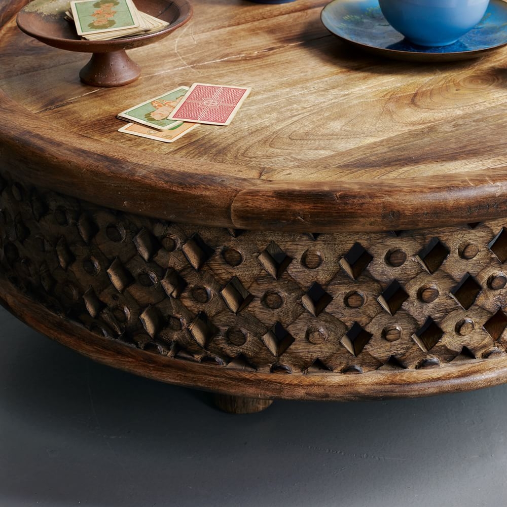 Carved wood outlet table
