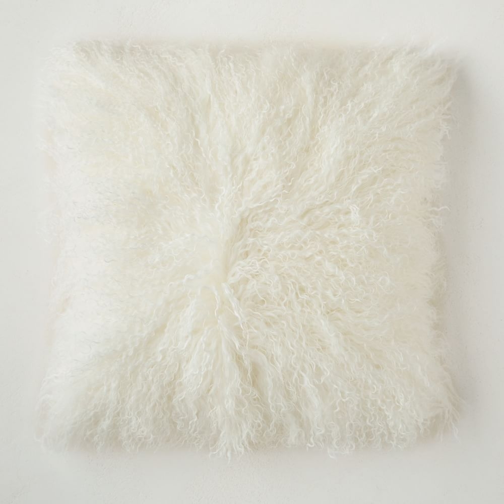 Cream top mongolian cushions