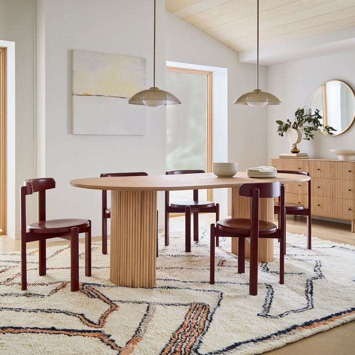 Oval pedestal shop dining table
