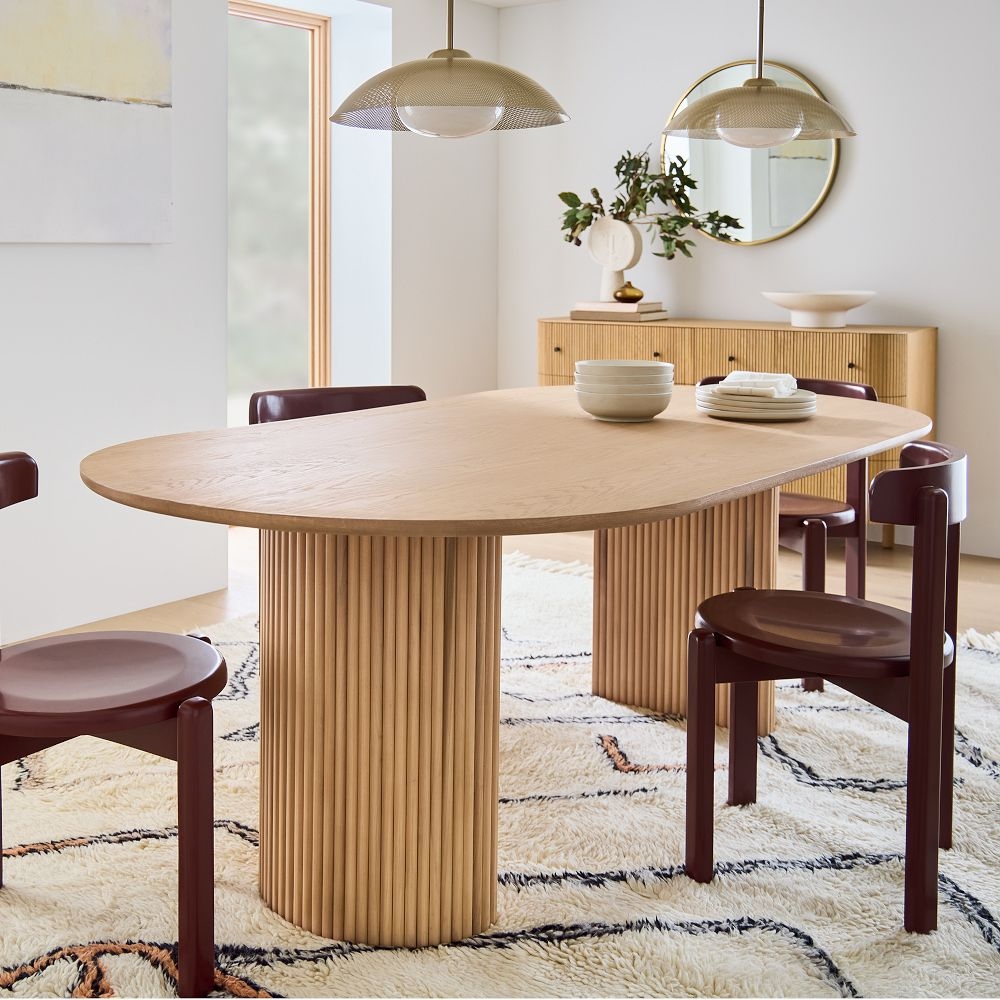 Oval pedestal shop dining table
