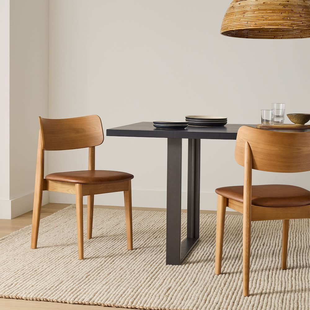 Mid century hot sale dining chairs leather