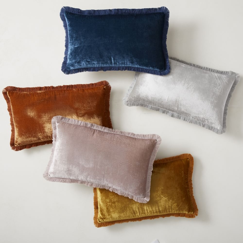 Designer throw pillows with fringe top