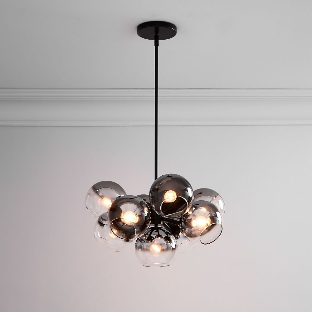 Staggered outlet glass chandelier