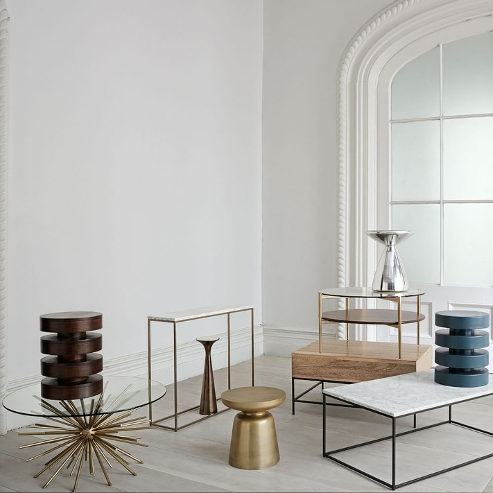 Glass brass shop coffee table