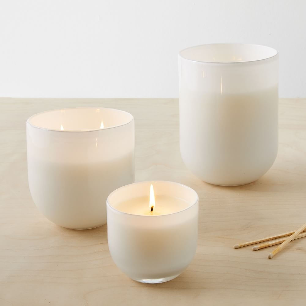 White candles in glass hot sale holder