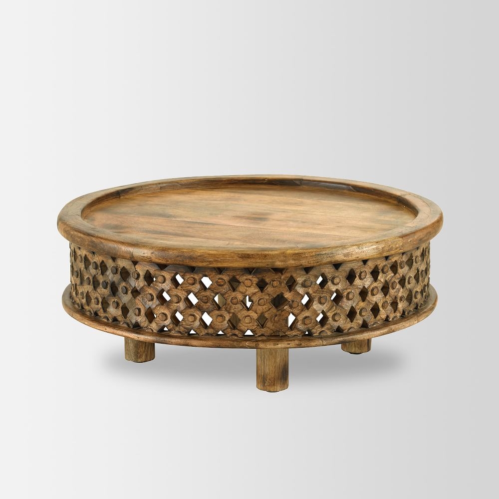 Carved wood outlet table